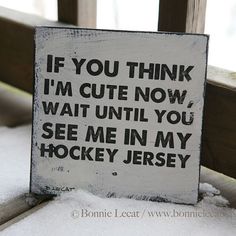 a sign that says if you think i'm cute now, wait until you see me in my hockey jersey