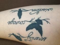 two birds on a branch with the words serenity, courage, and vision written in cursive font