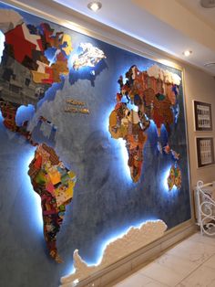 a large map of the world on a wall