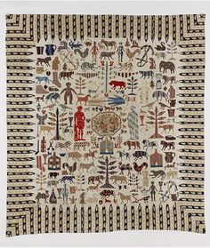 a quilt with many different types of animals and people on it's sides, all in various colors