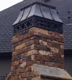 a clock on top of a brick tower