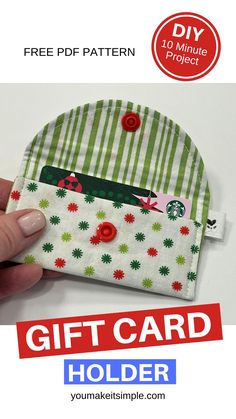 a hand holding a small gift card holder with the text free pattern on it and an image