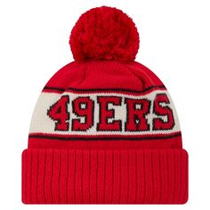 a red and white knit hat with the word 94ers on it