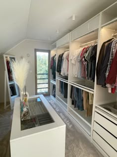 the closet is full of clothes and other items