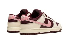 The Nike Dunk Low Premium “Valentine’s Day 2023” is a festive colorway of the retro basketball shoe that celebrates the Lover’s Holiday.  The “Valentine’s Day” Dunk Low is the 2023 version of the popular theme that shows love, no pun intended, to Valentine’s Day.  This time around, the shoe features a two-tone, maroon and Pale Ivory color combination.  Specifically, maroon leather appears on the base while Pale Ivory leather overlays.  A pink tumbled leather Swoosh is found on either side of the 2023 Shoes, Sneaker Displays, Kobe Shoes, Retro Basketball Shoes, Womens Basketball Shoes, Retro Basketball, Kicks Shoes, Shoe Wishlist, Maroon Leather