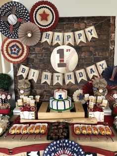 a baseball themed birthday party with cake and decorations