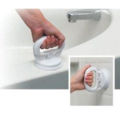 a hand holding a bottle opener on top of a white sink next to a faucet