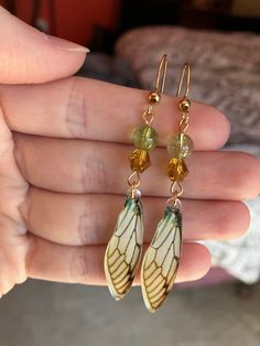 Gold butterfly wing earrings made with green and orange beads. Butterfly Wing Earrings, Butterfly Wing, Wing Earrings, Gold Butterfly, Butterfly Wings, Jewelry Creation, Costume Design, Cute Jewelry, Design Templates