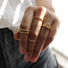 Super cute, minimal gold filled roped stacking ring. This ring features a delicate 1mm twisted band. It is water friendly but note- it is dainty and meant to pair with others for added durability. Available in whole sizes 5-9. Materials: 14k Gold Filled Band Width: 1mm Hypoallergenic. Nickel and lead free. What does Gold-Filled mean? Gold filled jewelry contains 1/20th (5%) of real gold content, or more than 100x real gold content that most gold plated jewelry. The process to make gold-filled je Gold Rings Classy, Stackable Gold Rings, Stackable Rings Gold, Gold Stackable Rings, Minimal Gold, Double Band Rings, Velvet Jewelry, Twist Ring