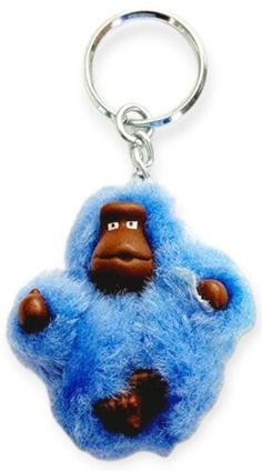 a blue stuffed animal keychain hanging from a metal ring