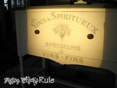 a white cabinet with the words wine and spirituex on it's side