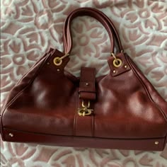 High Quality Italian Leather, Vintage Ferragamo Medium Sized Bag In Red. Original Dust Bag. Never Used, Was Gifted To Me But Isn’t My Style, Hopefully Someone Who Loves The Classics Can Give This Bag The Love And Use It Deserves! Designer Shoulder Bag With Brass Hardware, Formal Satchel Shoulder Bag With Horsebit Detail, Formal Horsebit Detail Shoulder Bag, Designer Burgundy Shoulder Bag With Branded Hardware, Elegant Shoulder Bag With Horsebit Detail, Elegant Business Shoulder Bag With Horsebit Detail, Luxury Burgundy Shoulder Bag With Gold-tone Hardware, Formal Leather Shoulder Bag With Horsebit Detail, Elegant Satchel With Horsebit Detail