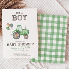 it's a boy baby shower card with green tractor and gingham paper