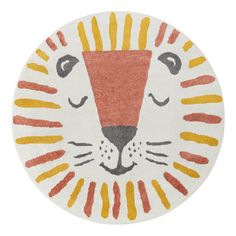 a round rug with a lion face on it's side and yellow stripes around the edges