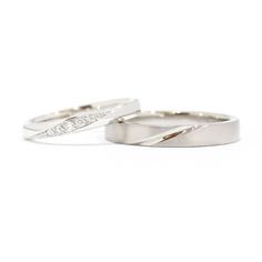 two white gold wedding rings with diamonds