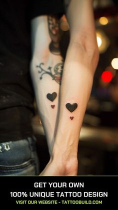 two people with tattoos on their arms holding each other's hands and the text get your own 100 % unique tattoo design