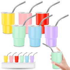 colorful tumbler cups with straws and spoons in each cup, on a white background