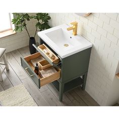 a bathroom vanity with drawers and a sink