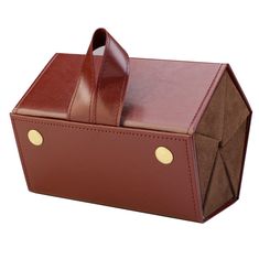 a brown leather storage box with two handles