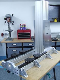 a workbench with tools and equipment on it