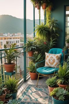 a balcony with lots of potted plants on the side and a chair in front