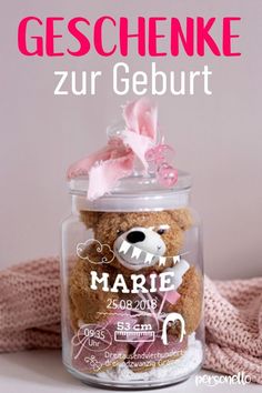 a teddy bear in a jar with the name geschhenke on it