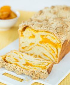 a loaf of bread sitting on top of a white plate