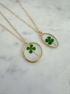 Beautiful 4 leaf clover pressed flower necklace! This sweet and delicate pressed clover pendant necklace is perfect to wear as your "something green" for St. Patrick's Day, but is also a beautiful piece to wear all Spring and Summer long! Comes on 14k gold filled chain with 14k gold filled jump rings/clasps. The round pendant measures approximately 1" in length and the oval pendant measures approximately 1.25" in length. Choose shape and necklace length at checkout. Gift box included! Pressed Clover, Something Green, Pressed Flower Jewelry, St. Patrick’s Day, Pressed Flower Necklace, Four Leaf Clover Necklace, Clover Pendant, 4 Leaf Clover, 4 Leaves