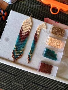 beading supplies are laid out on a table