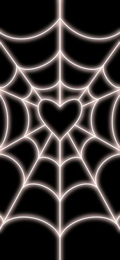 a spider web with a heart in the center