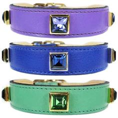 three different colored leather dog collars with gold hardware and square crystal stones on each side