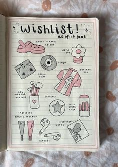 an open notebook with drawings on it and the words wishlist written in black ink