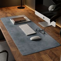 a computer desk with a mouse and keyboard on it