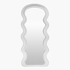 a white mirror with wavy shapes on the front and back sides, against a white background