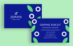 two blue business cards with green leaves on them