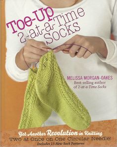 the cover of toe - up knitting socks, with an image of a woman holding a green sock