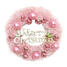 a wreath with pink ornaments and merry christmas written on it