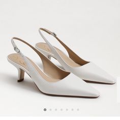 Style #Ec0238364 Small Heel, Sling Back, Sleek Lines, Say No More. The Bianka Slingback Pumps Are Everything. Heel Height: 2.4 Inches Toe: Pointed Toe Closure: Buckle Material: Leather, Fabric, Synthetic Insole: Synthetic I Wore Once For My Wedding. Size 5 & 1/2 Wedding Shoes Inspiration, White Sling Back Heels, Wedding Event Outfits, Small Heels, Sling Back Shoes, Sling Back Pumps, Fun Wedding Shoes, Sam Edelman Heels, Sling Back Heels