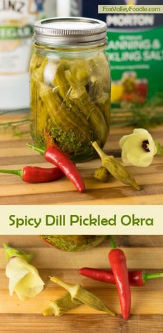 pickled okra in a jar on a cutting board