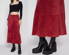 "Vintage 90s boho raspberry red suede midi skirt, with a high waist, and a subtle mermaid hem. It has a side zipper for closure. Measurements and Condition: Fits like: Labeled size 12, best fits modern women's medium Fabric: Suede leather shell with a polyester lining Brand: Converge Condition: Very good, with light general wear Length: 34\" Waist: 29\" Hips: 40\"  Shown on a 5'8\" model with measurements of 34\"-26\"-37\", usually wears a size small. See our FAQ for more info on sizing and condition ratings." Red Midi Lined Skirt, Red Lined Midi Skirt, Retro Red Long Skirt, Red Midi Skirt Outfit, Vintage Long Red Skirt, 90s Midi Skirt, Suede Skirt Outfit, Vintage Red Ruffled Skirt, Red Long Skirt