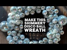 a wreath made out of disco balls with the words make this shimmery disco ball wreath