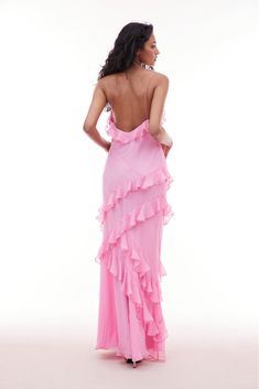 Our best-selling Rialto Dress returns in three new dreamy colorways. Designed completely with a silky chiffon fabric, this must-have maxi stuns with overlapping, asymmetrical ruffles at the neckline that continue to descend through the entire skirt. Slightly fitted, this dress features a sexy silhouette and includes a side seam zipper for closure.