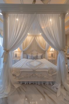 a white bed sitting in the middle of a room with curtains on it's sides