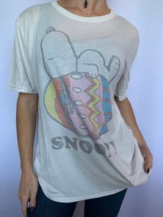 "Vintage Snoopy Tee, Easter egg Snoopy t-shirt, Purchased at Beams in Tokyo Japan early 2000's Size Medium  Chest 19\" wide (armpit to armpit) Length 26\" from high point shoulder Excellent worn condition Happy to send additional photos and measurements so you are confident in your purchase" Snoopy Easter, Vintage Snoopy, Snoopy T Shirt, Be Confident In Yourself, Vintage Tools, High Point, Tokyo Japan, Easter Egg, Vintage Shirts