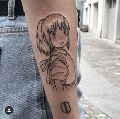 a person with a tattoo on their arm