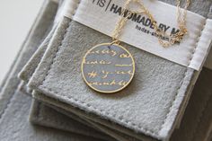 "Round shaped concrete & yellow gold handwriting text pendant with a long goldfield chain. This necklace combines handwritten KAFKA quote into a delicate and modern design of gold plated pendant with special inlay concrete gray polymer. (\"Anyone who keeps the ability to see beauty never grows old\" Franz Kafka) The Matt satin finish gives an added value and emphasizes the handwriting script in each piece. Each design is done by the artist Hadas Shaham- in a special material technique which Handwriting Script, Concrete Jewelry, Cube Necklace, Franz Kafka, Never Grow Old, Silver Cleaner, Everyday Necklace, Send Gift, Oxidized Sterling Silver