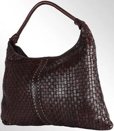 This stylish and practical hobo bag is perfect for busy women on the go. Made from full-grain leather, it's durable and will stand up to daily wear and tear. The double-compartment design is great for organizing your belongings, and the adjustable strap means you can find the perfect fit. Plus, the Antique Metal Alloy zipper adds a touch of luxury. Whether you're heading to work, the gym, or running errands, this hobo bag is a great choice. Spaghetti Western, Hobo Handbags, Antique Metal, Handcrafted Leather, Hobo Bag, Full Grain Leather, Daily Wear, Bags Handbags, Leather Handbags