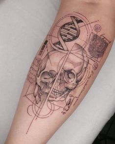 a person with a skull tattoo on their arm