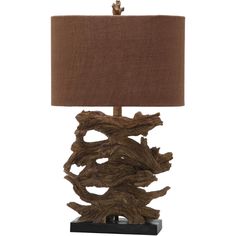 a table lamp with a brown shade on it