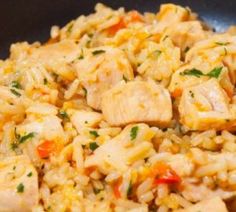 chicken and rice in a skillet ready to be eaten